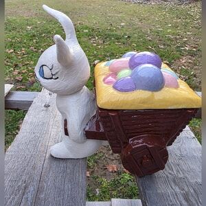 Charming White Bunny Cart with Colorful Eggs